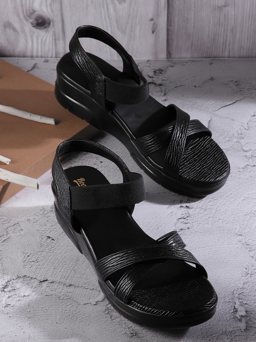 

Roadster Women Black Solid Open Toe Comfort Heels