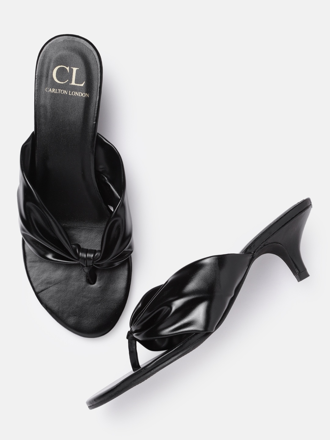 

Carlton London Women Black Solid Kitten Heels with Patent Finish