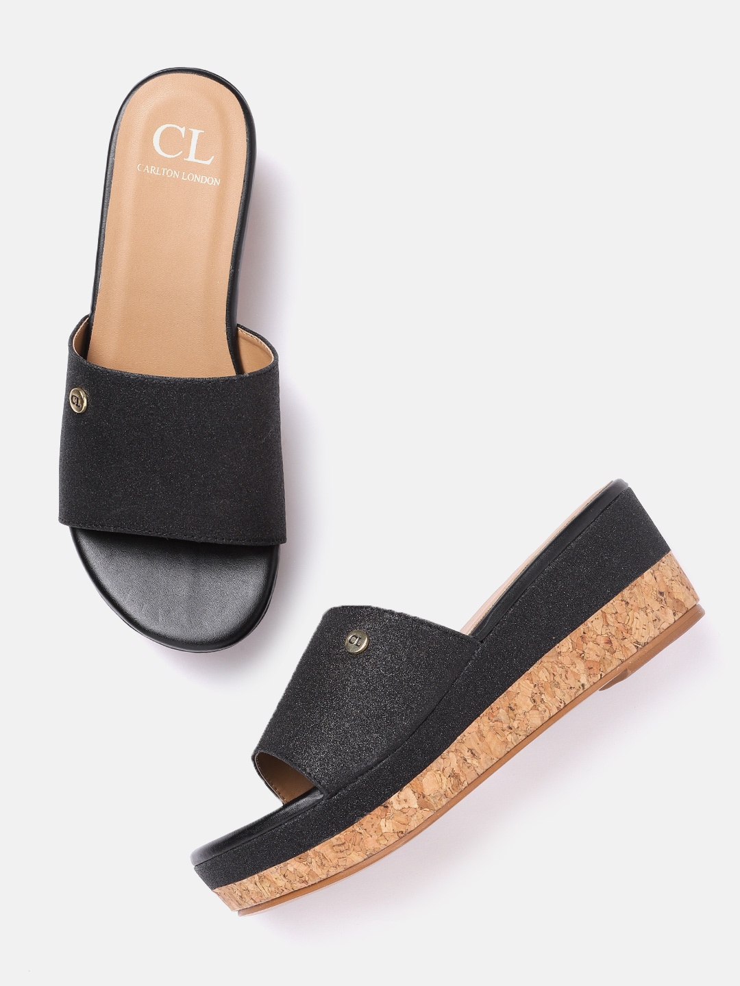 

Carlton London Women Black Solid Wedge Heels