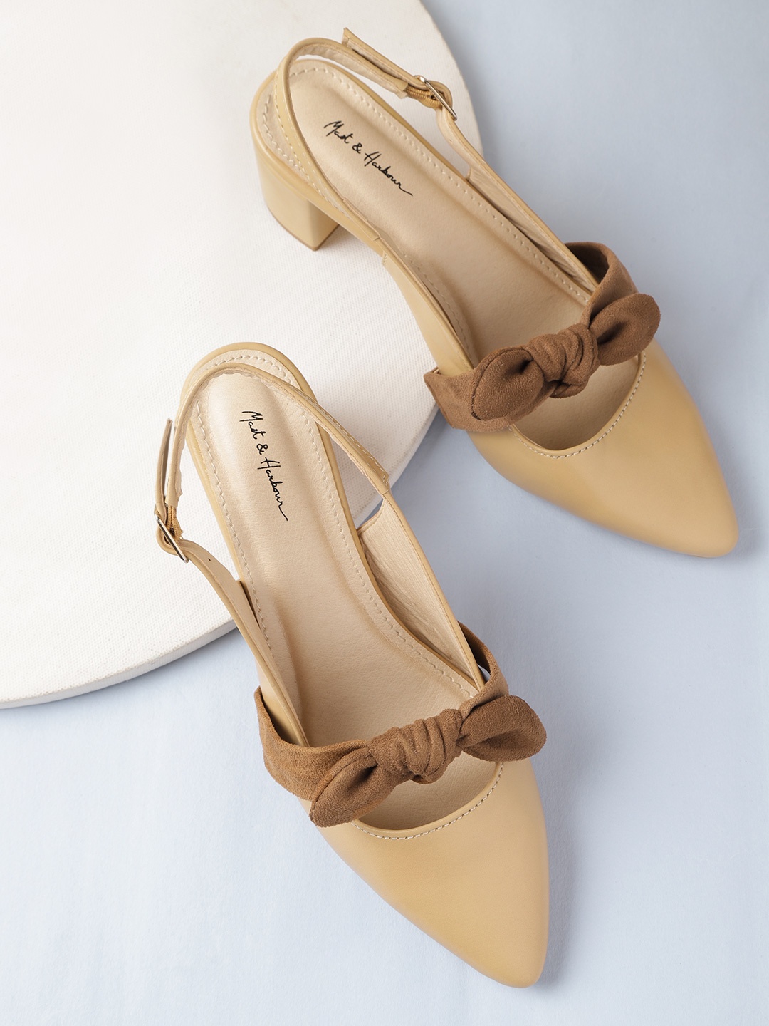 

Mast & Harbour Women Beige Solid Block Mules with Bows