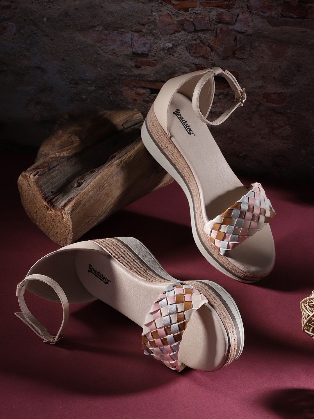 

Roadster Women Beige & Brown Woven Design Wedge Heels