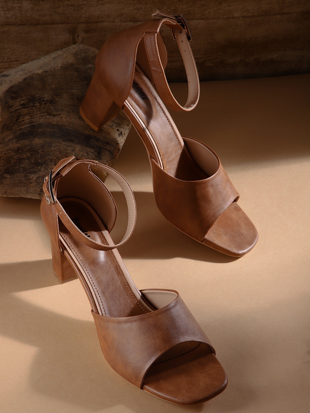 

Roadster Brown Solid Block Heels