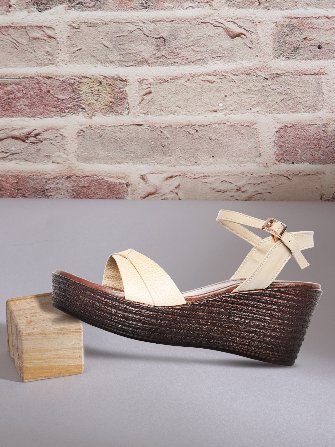 

Roadster Beige Textured Wedge Sandals