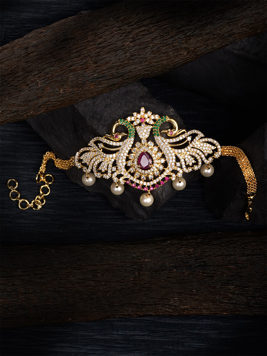 

Saraf RS Jewellery Women Gold-Toned & White Brass AD Studded Handcrafted Armlet Bracelet