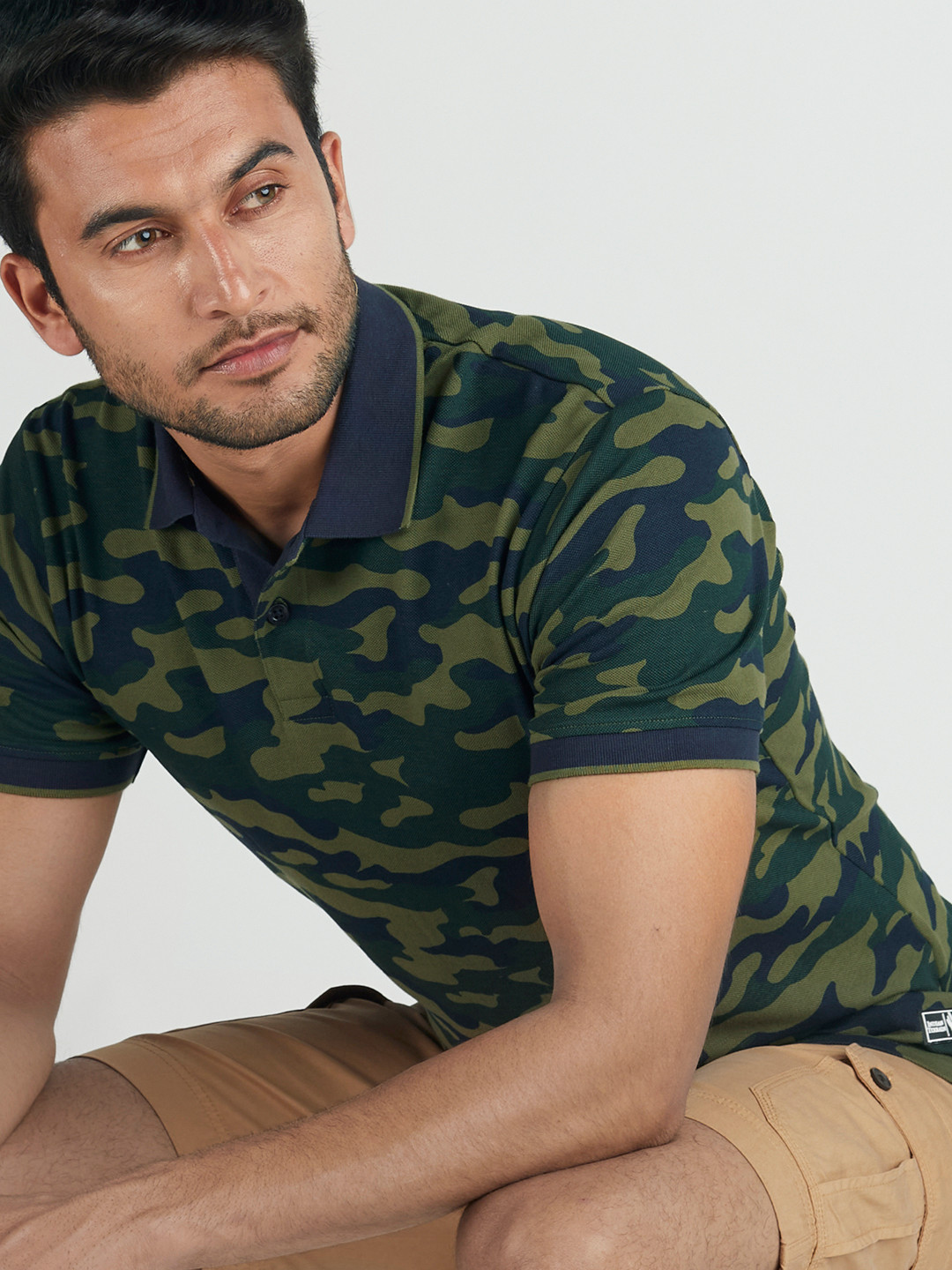 

Indian Terrain Men Navy Blue & Green Camouflage Printed Polo Collar T-shirt