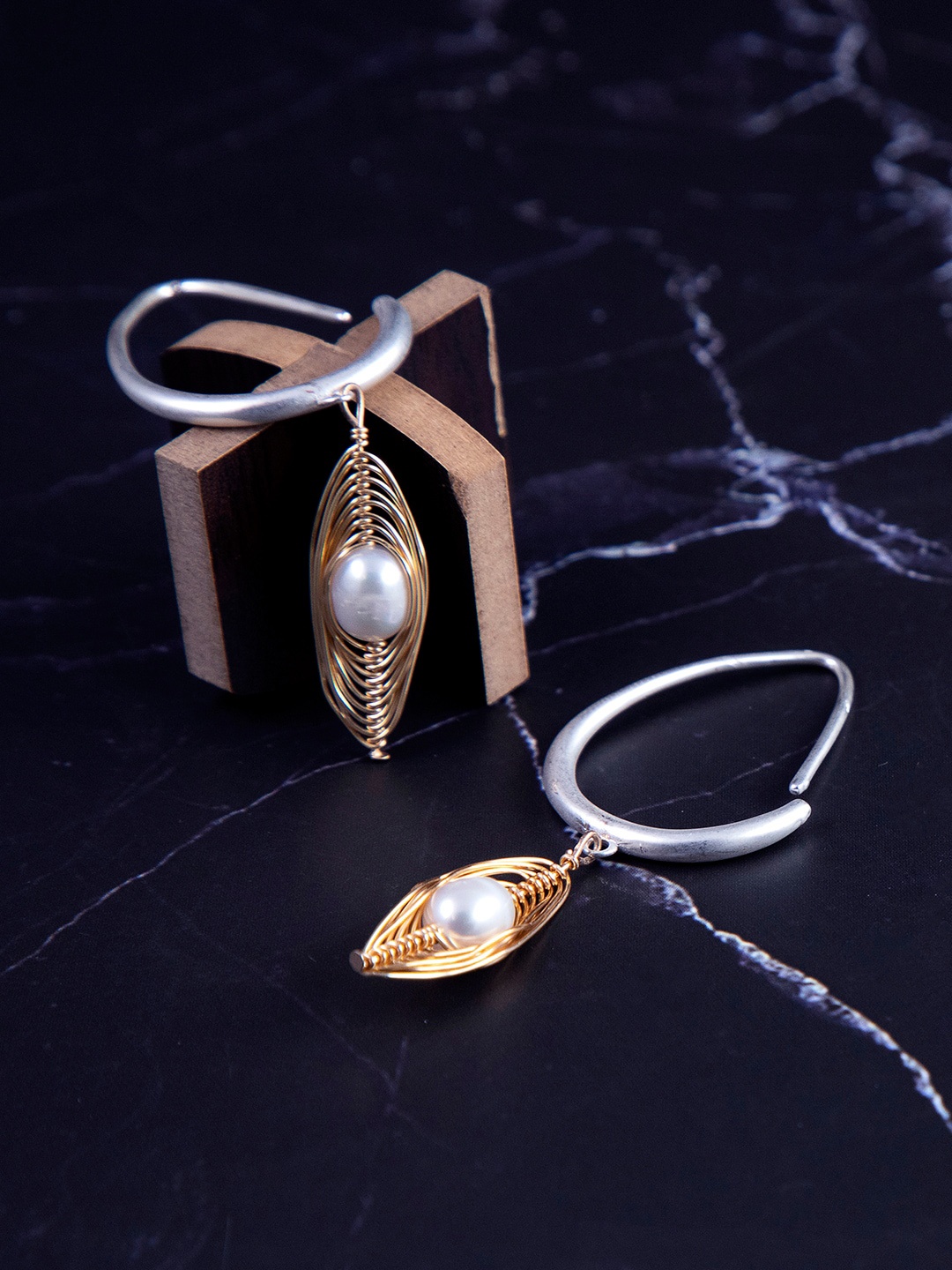 

anore Women Gold-Plated White Oval Shaped Pearl Half Hoop Earrings