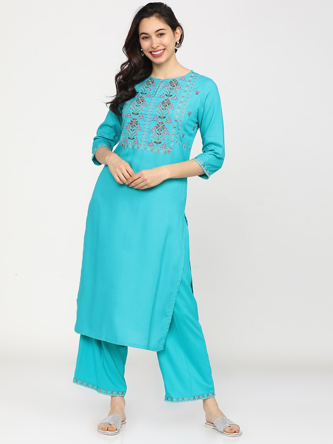 

Vishudh Women Turquoise Blue Ethnic Motifs Printed Ethnic Palazzos