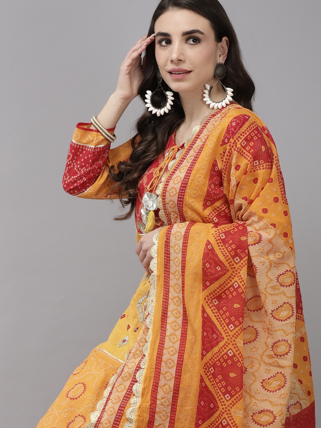 

Indo Era Women Yellow Bandhani Regular Kurta with Sharara & With Dupatta