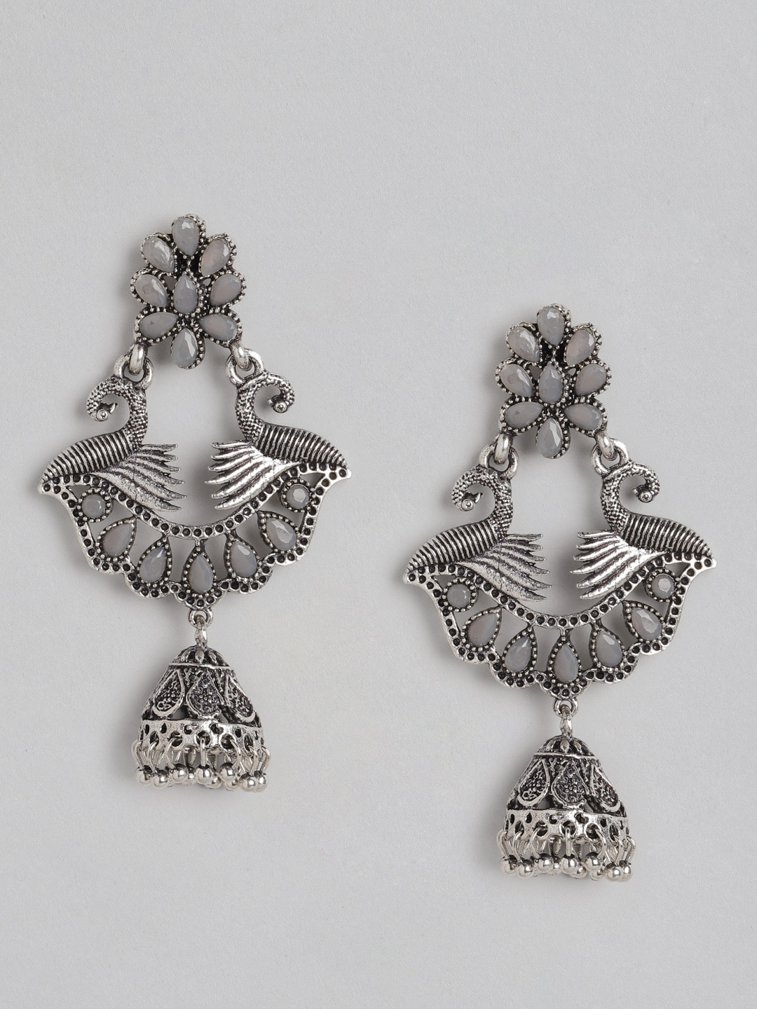 

Anouk Silver-Toned Oxidised Stone Studded Peacock Shaped Jhumkas