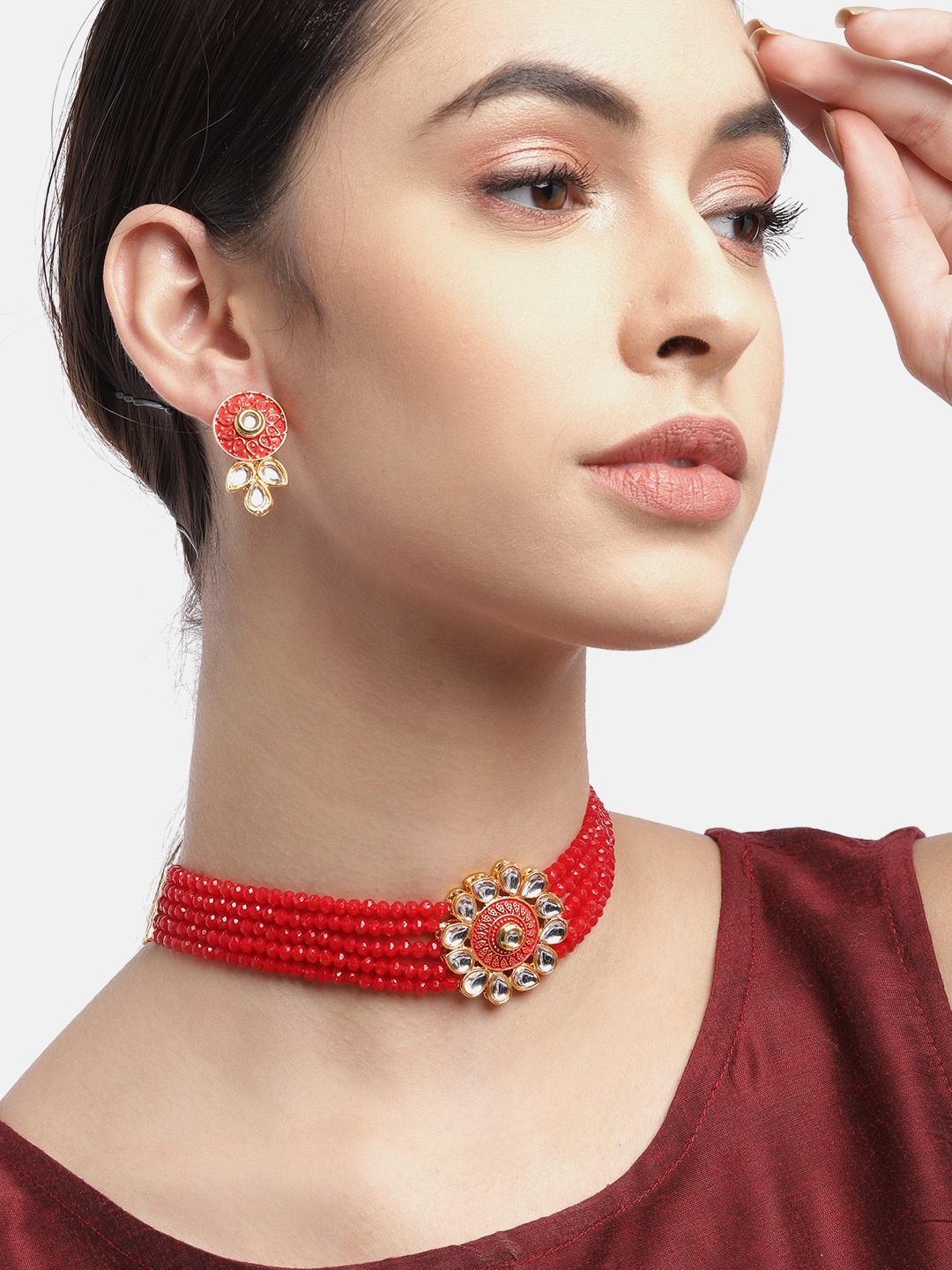 

Anouk Red & Gold-Toned Kundan Studded & Beaded Jewellery Set