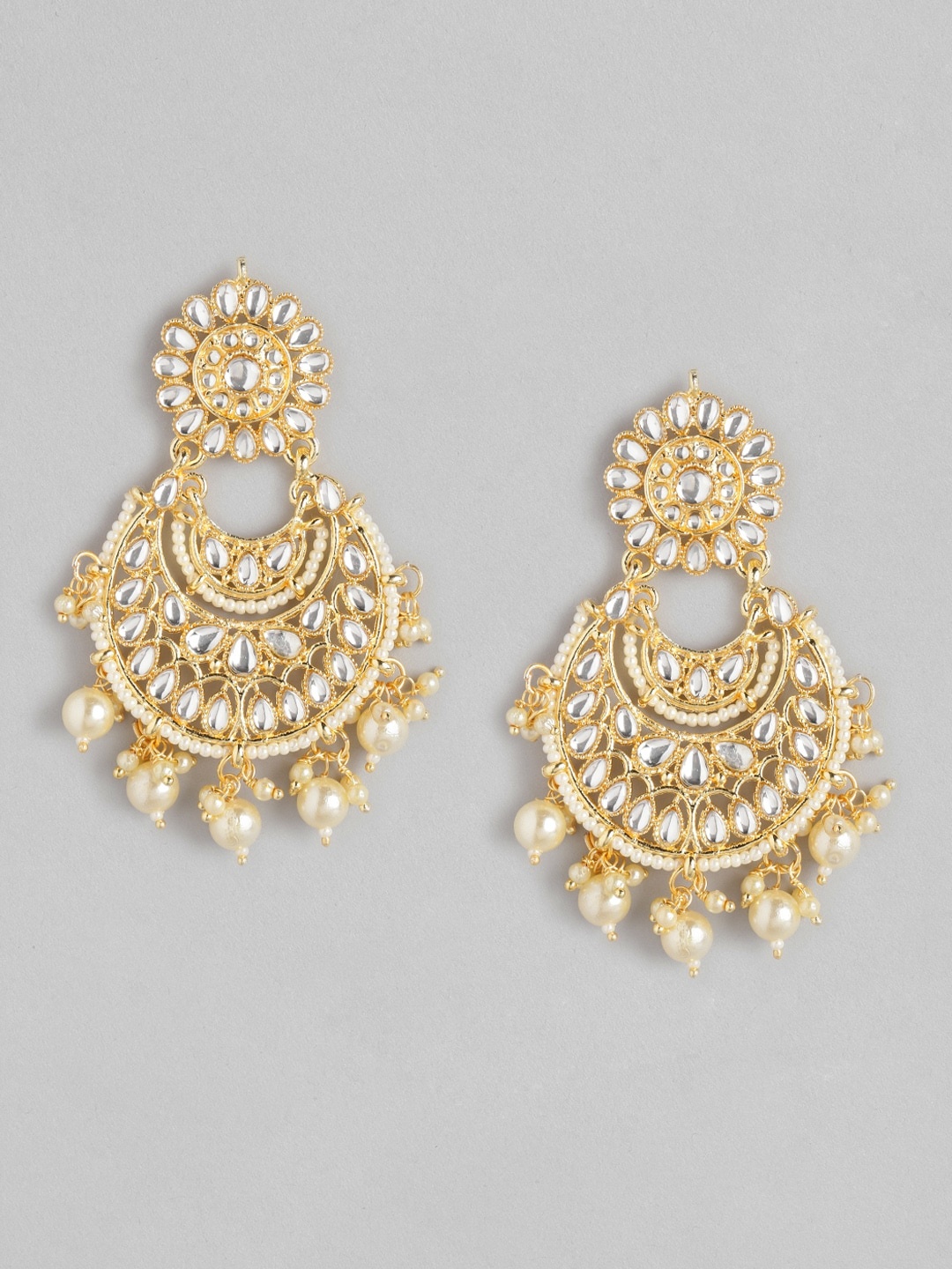 

Anouk Gold-Toned & White Kundan-Studded & Beaded Crescent Shaped Chandbalis