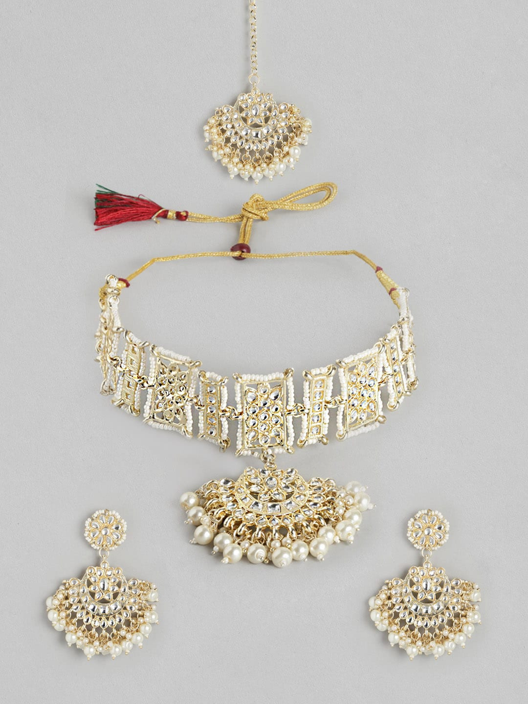 

Anouk Gold-Toned & Off White Stone Studded & Beaded Jewellery Set