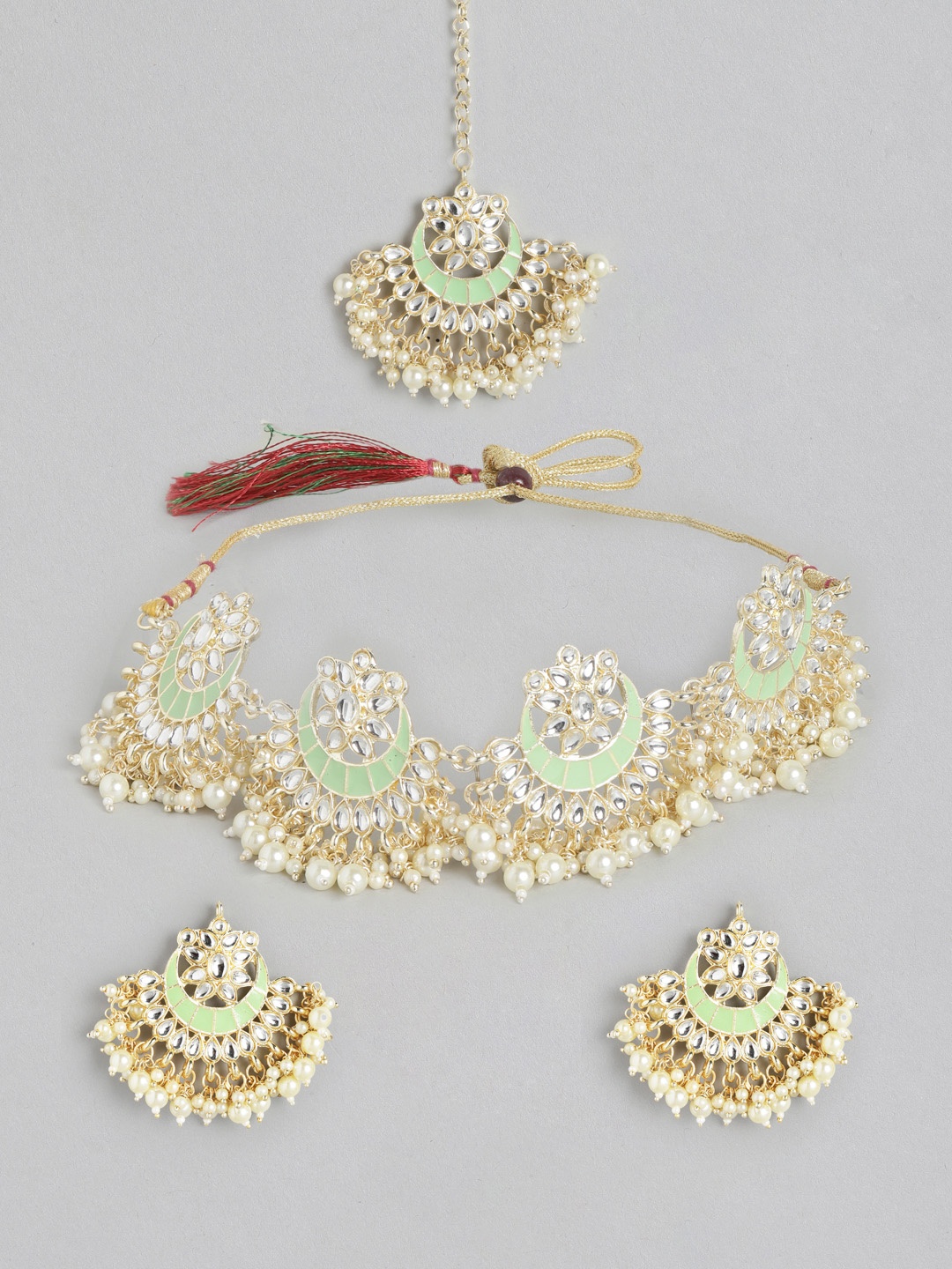 

Anouk Mint Green & Gold-Toned Stone Studded & Beaded Enamelled Jewellery Set