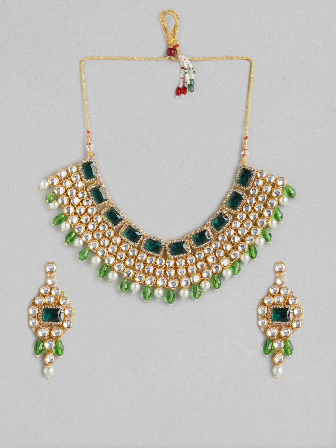 

Anouk Gold-Toned & Green Stone Studded & Beaded Jewellery Set