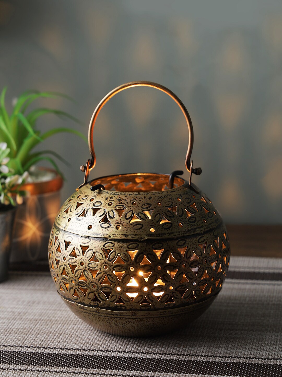 

Aapno Rajasthan Brown Textured Handcrafted Metal Candle Holder