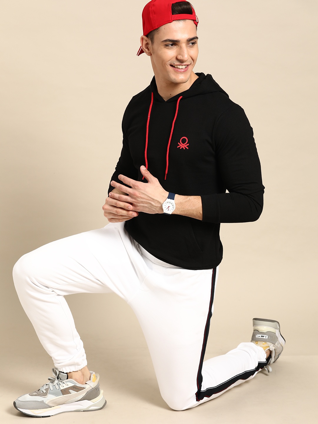 

United Colors of Benetton Men Black Solid Hooded Sweatshirt