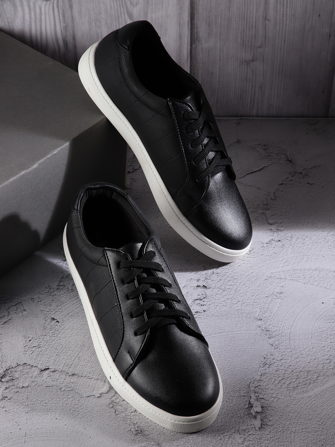 

The Roadster Lifestyle Co Women Black Croc Textured Sneakers