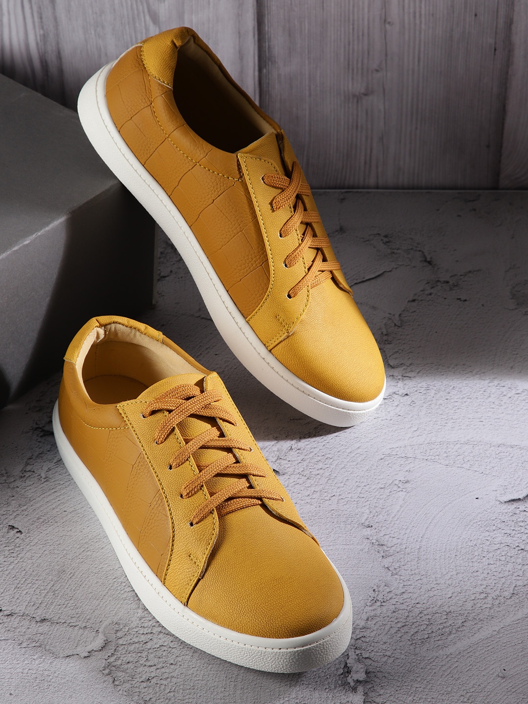 

The Roadster Lifestyle Co Women Mustard Yellow Croc Textured Sneakers