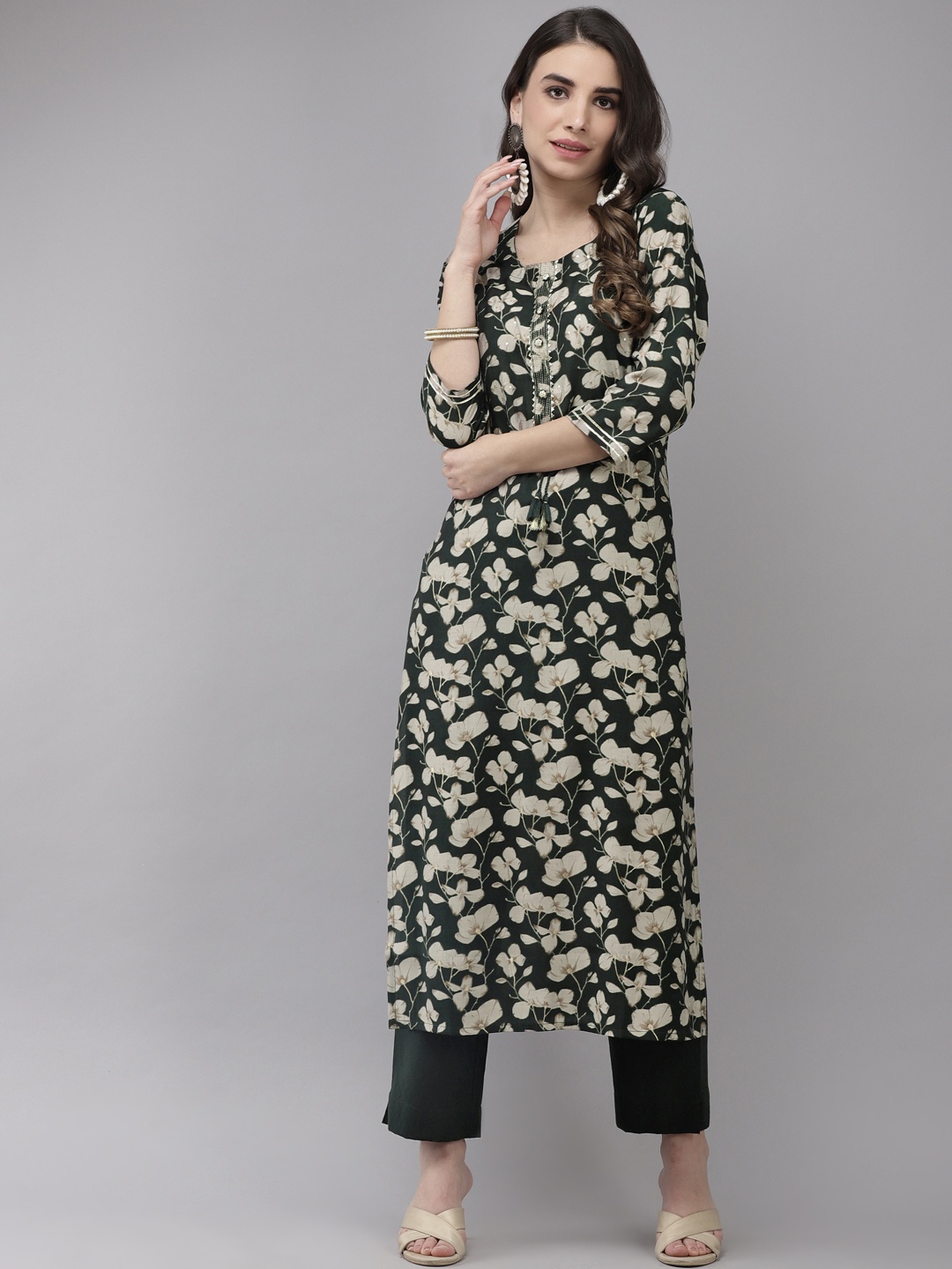 

Ishin Women Green Floral Embroidered Regular Sequinned Kurta with Trousers