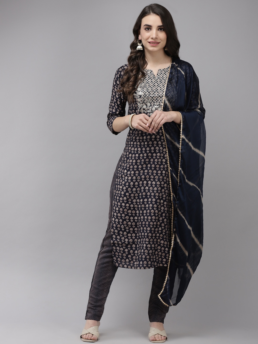 

Ishin Women Navy Blue Floral Embroidered Regular Kurta with Trousers & With Dupatta
