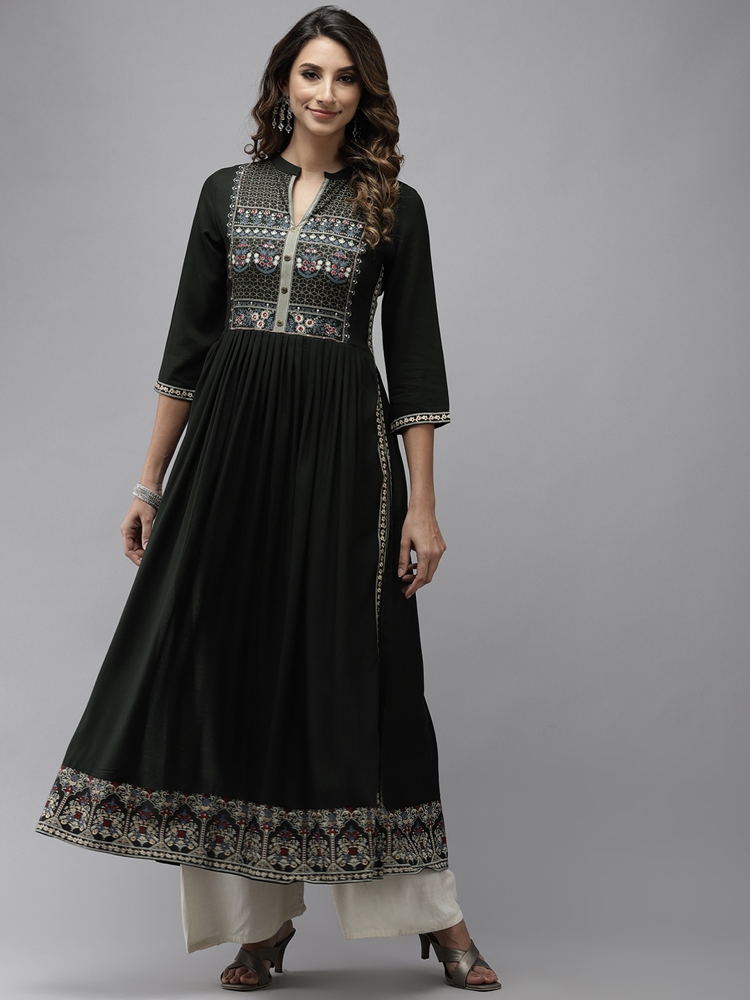 

Ishin Women Green Floral Yoke Design Thread Work A-Line Kurta