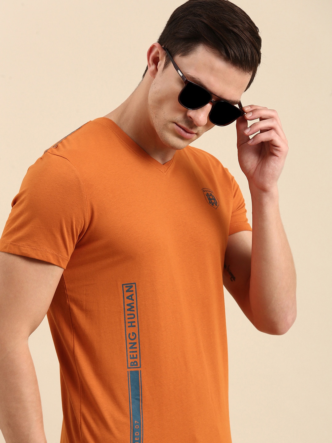 

Being Human Men Rust Typography Printed V-Neck Pure Cotton T-shirt