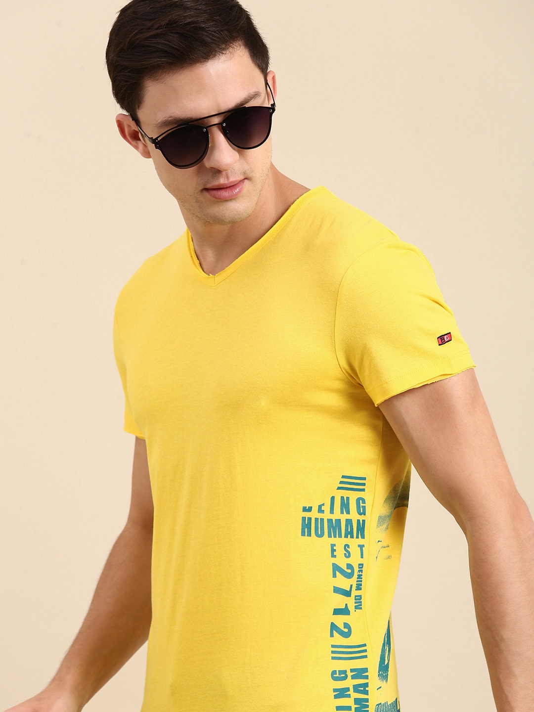 

Being Human Clothing Men Yellow Typography Printed V-Neck Raw Edge T-shirt