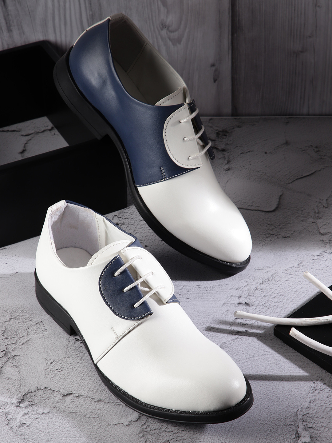 

Roadster Women White & Navy Blue Colourblocked Derbys