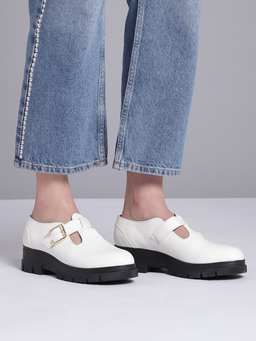

Roadster Women White Contrast Sole Loafers with Buckle Closure