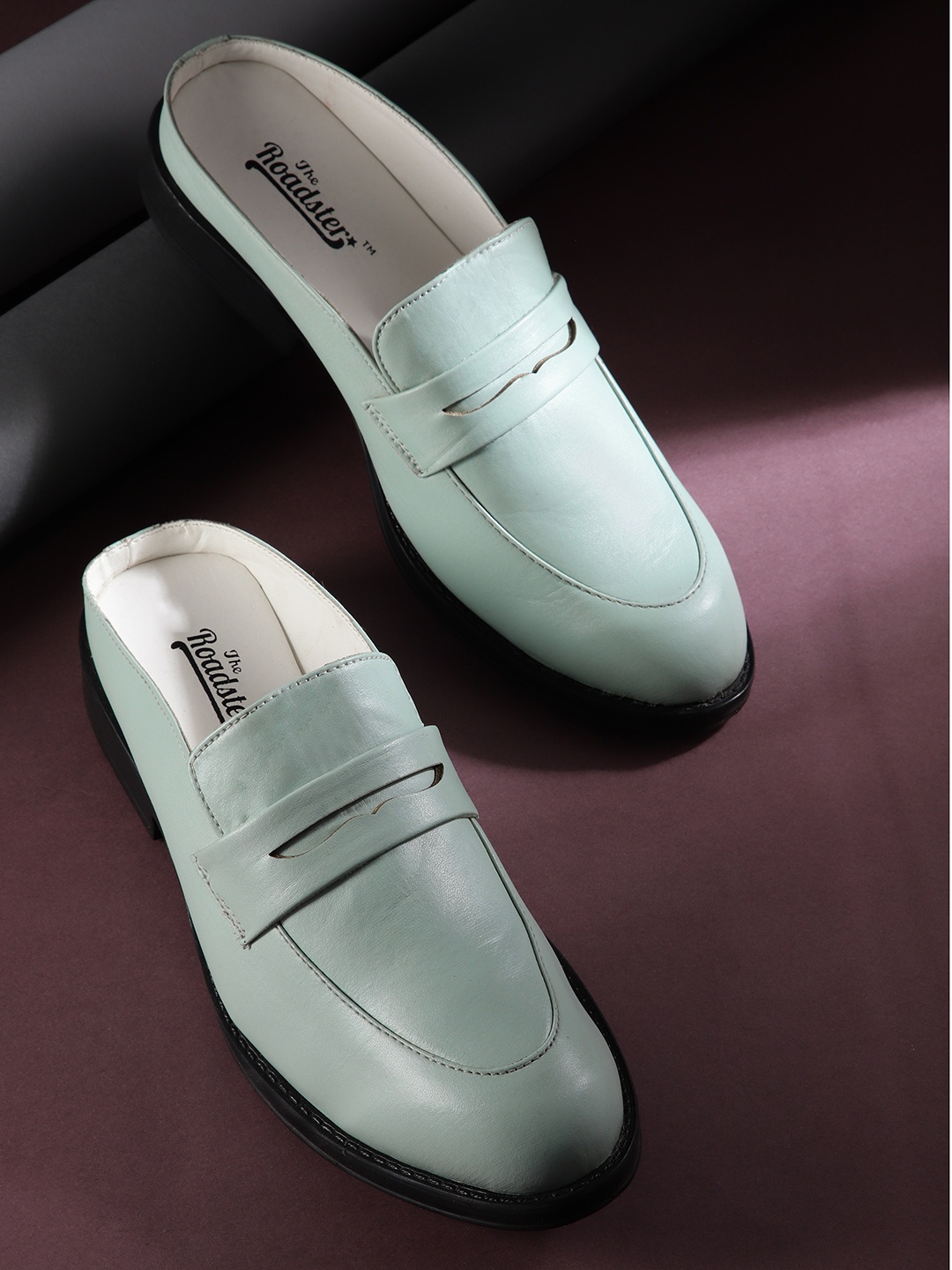 

Roadster Women Green Solid Mules