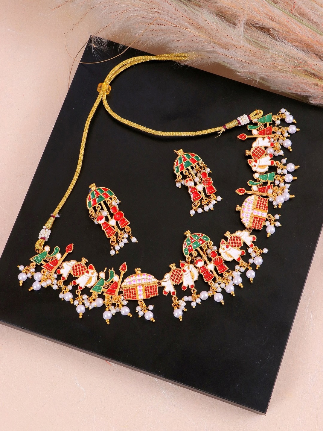 

Crunchy Fashion Gold-Plated & Red Doli Barati Shaped Meenakari Beaded Jewellery Set