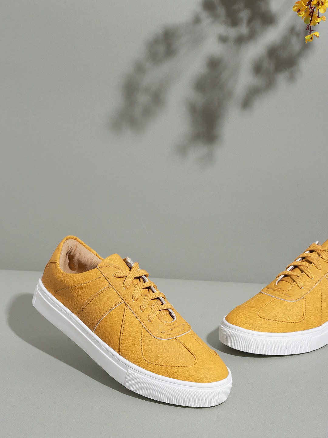 

Mast & Harbour Women Mustard Yellow Solid Sneakers