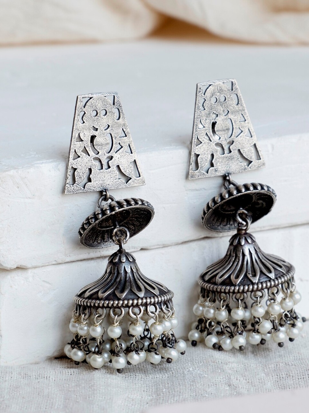 

Infuzze Silver-Toned Pearl Beaded Contemporary Jhumkas Earrings
