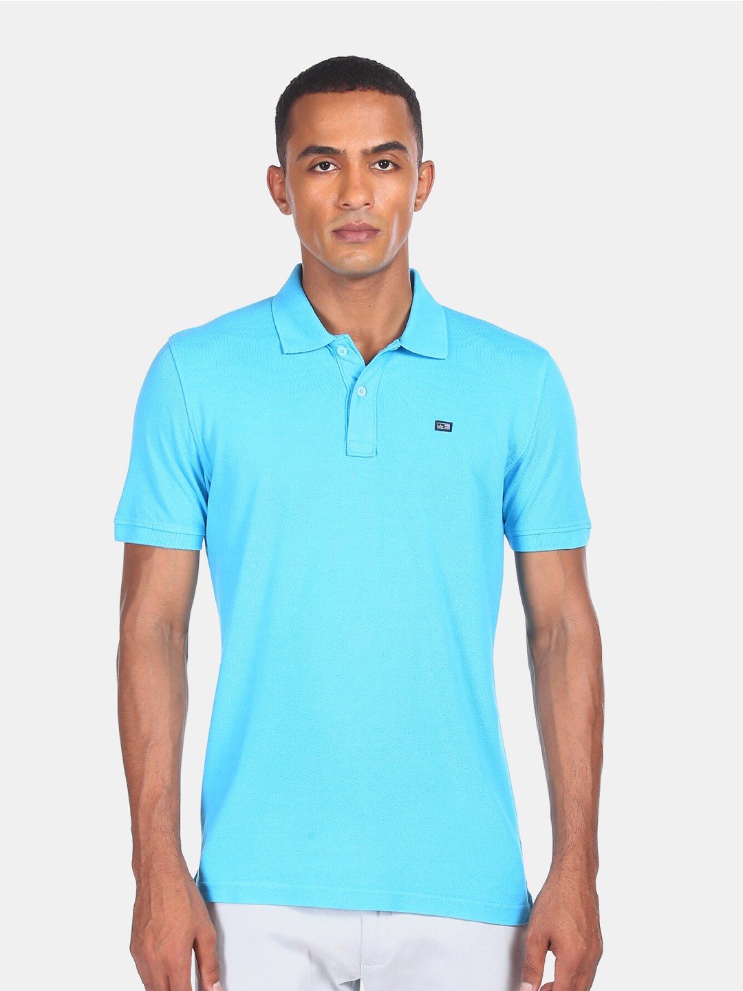 

Arrow Men Turquoise Blue Polo Collar T-shirt