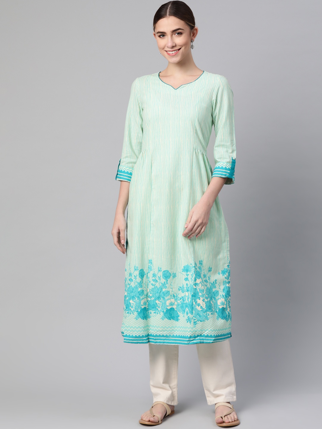 

Rangriti Women Turquoise Blue Striped And Floral Printed Kurta