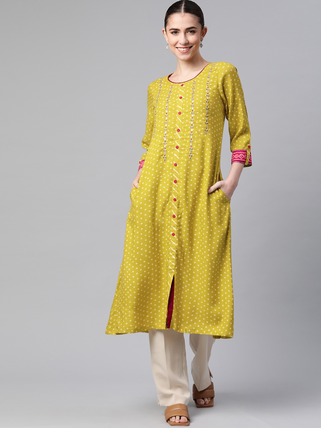 

Rangriti Women Mustard Yellow Geometric Printed Mirror Work Kurta