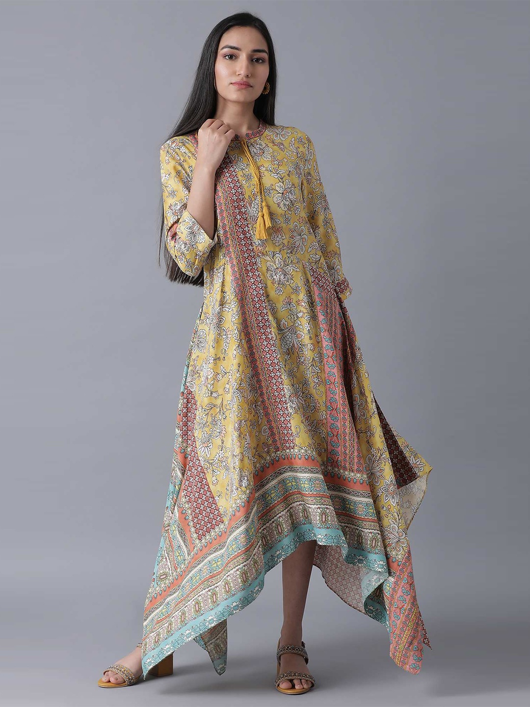 

W Yellow & White Ethnic Motifs Printed Tie-Up Neck Maxi Dress