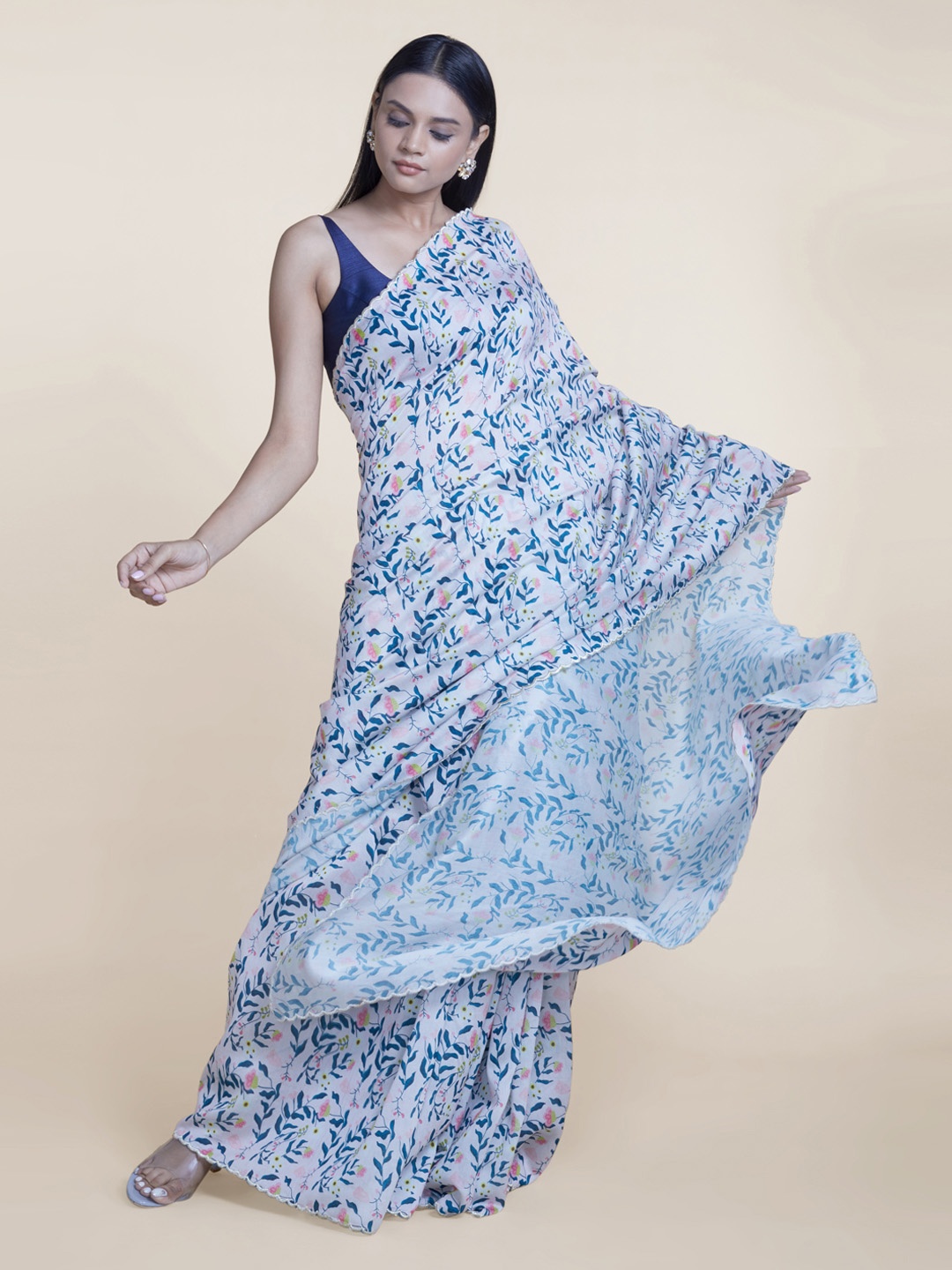 

Suta White & Blue Floral Pure Silk Saree