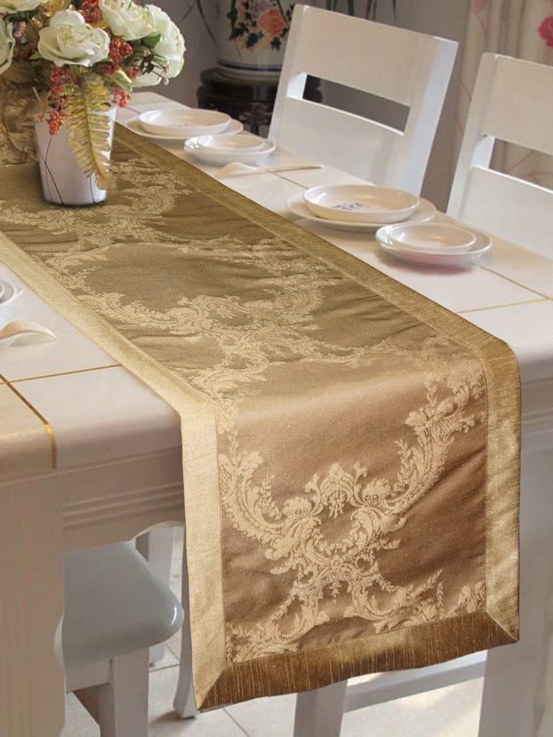 

Lushomes Gold Coloured Patterned Jacquard Table Runner