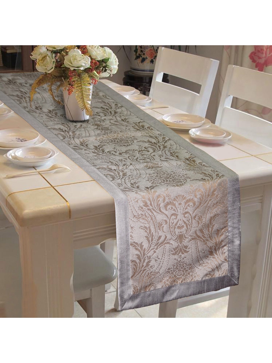 

Lushomes Grey & Gold-Coloured Self-Design Jacquard Table Runner