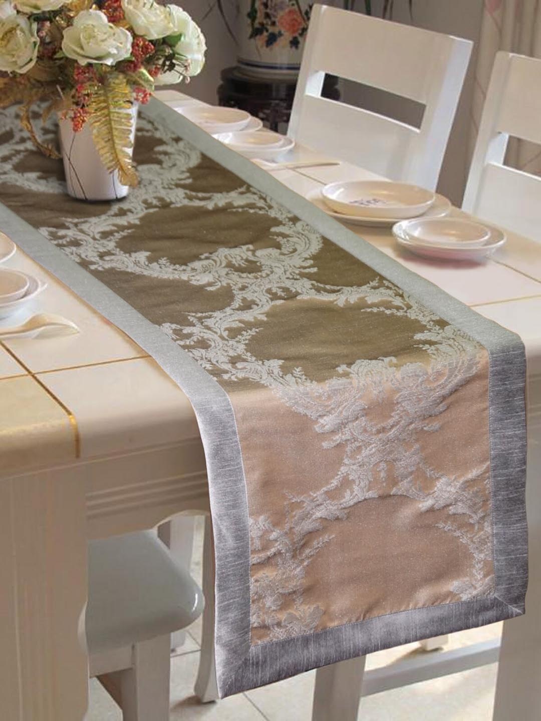 

Lushomes Grey & Gold-Coloured Self-Design Jacquard Table Runner