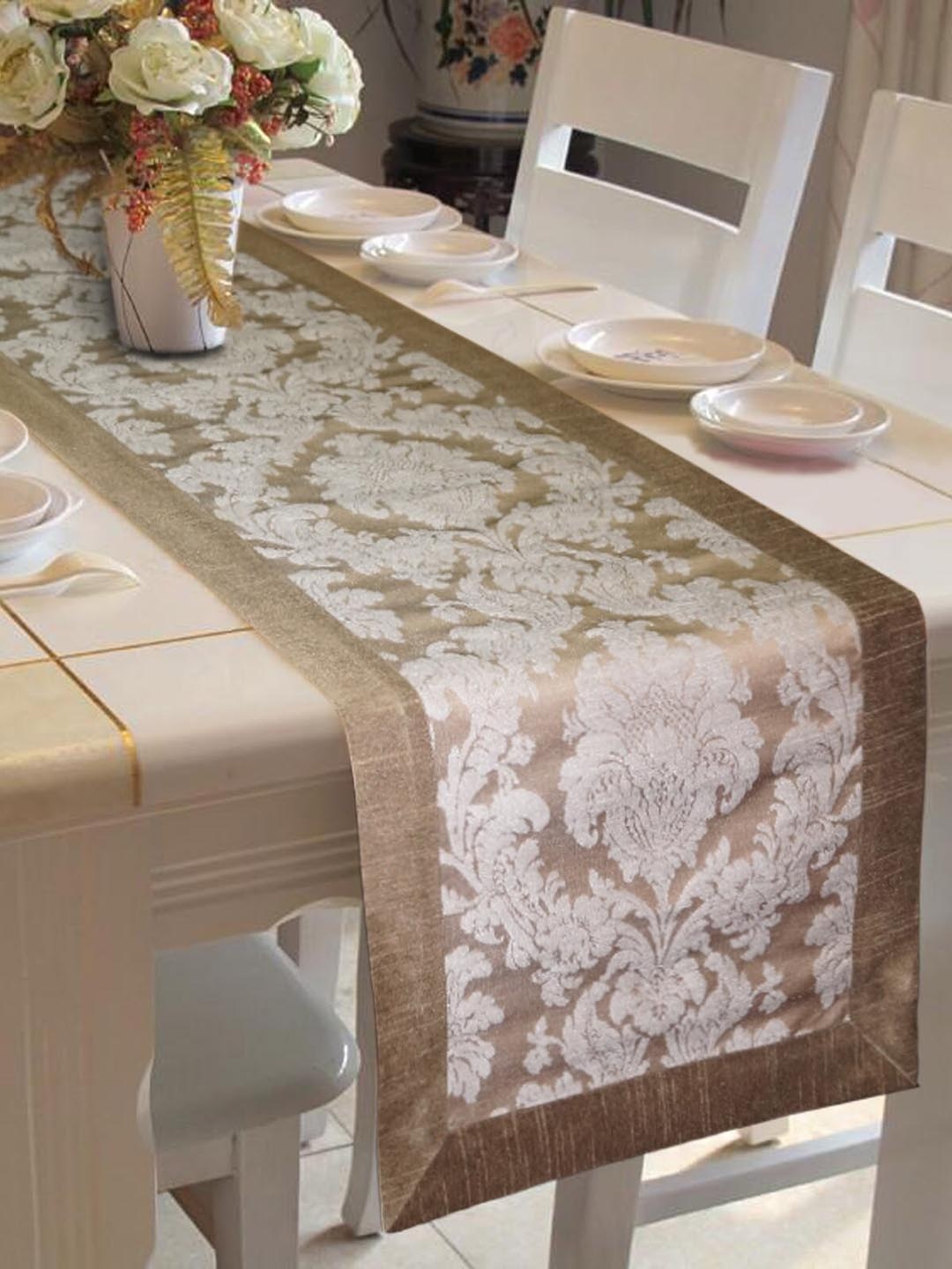 

Lushomes Grey & Gold-Coloured Self-Design Jacquard Table Runner