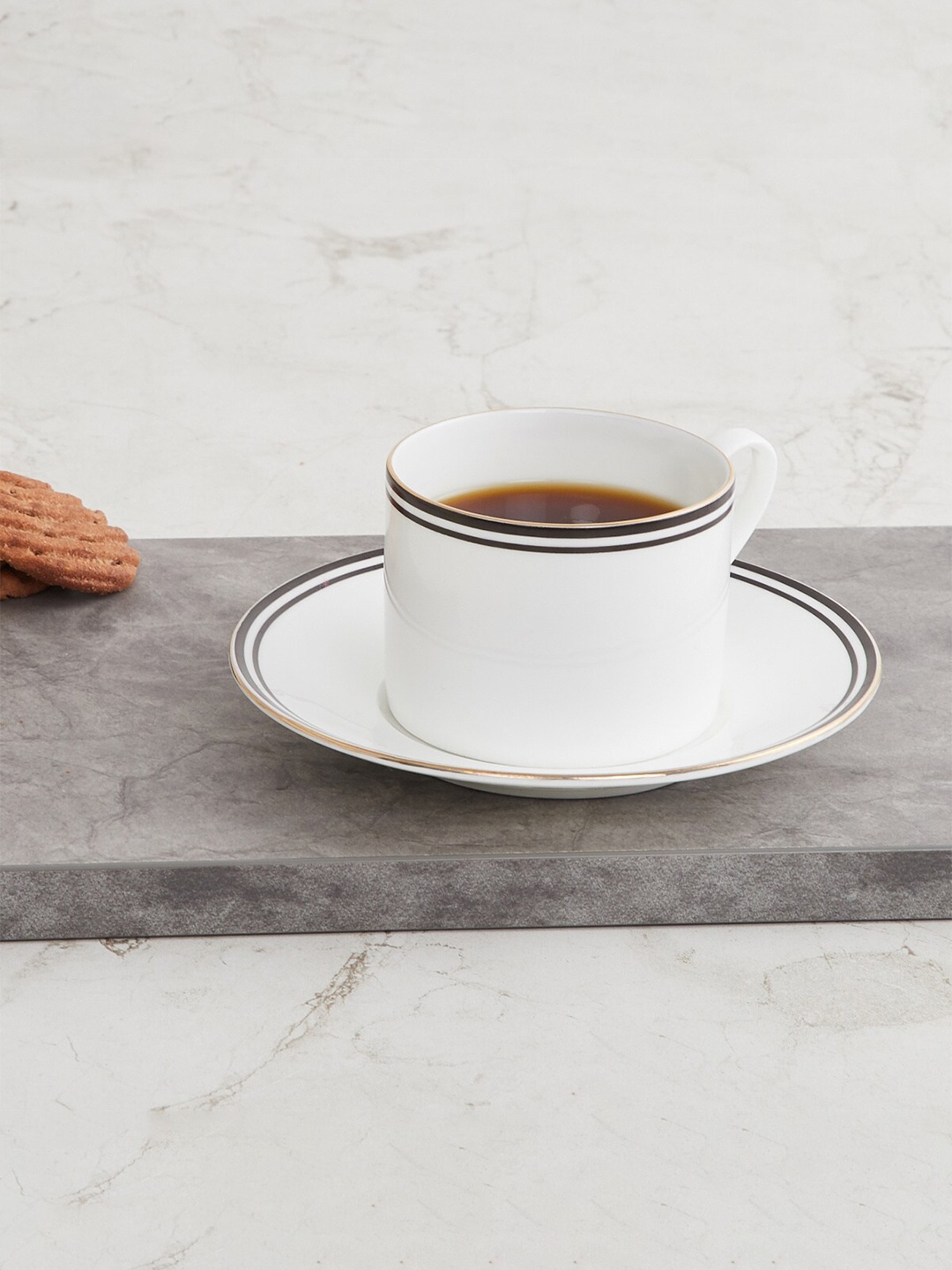 

Home Centre White & Black 1 Set Solid Ceramic Glossy Cups and Saucers
