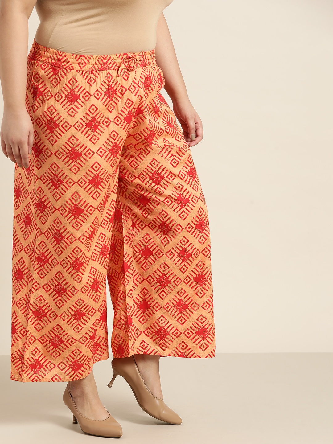 

Sztori Women Plus Size Orange & Red Printed Geometric Printed Palazzos