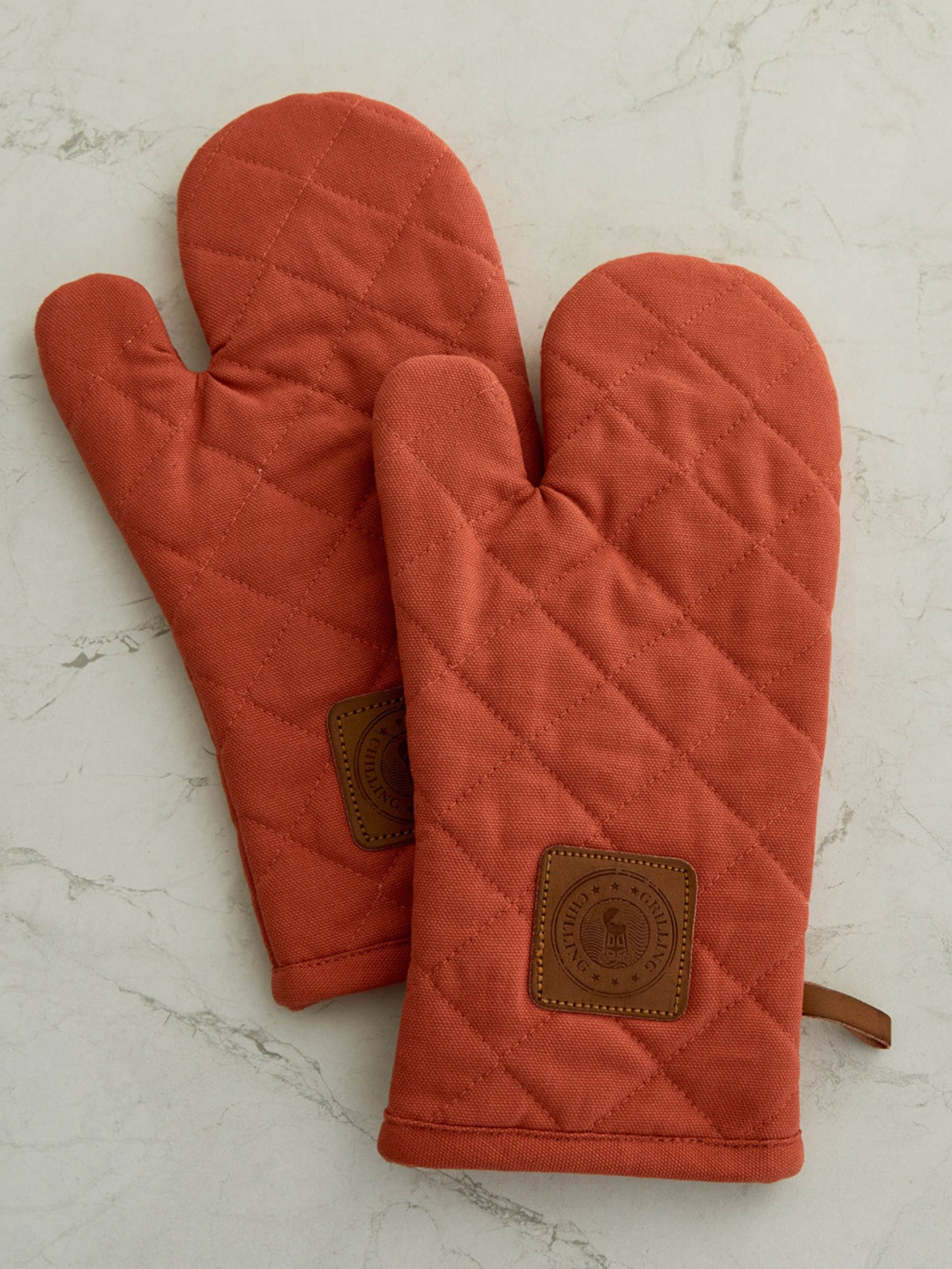 

Home Centre 2 Pieces Assorted Self Design Kitchen Mitten
