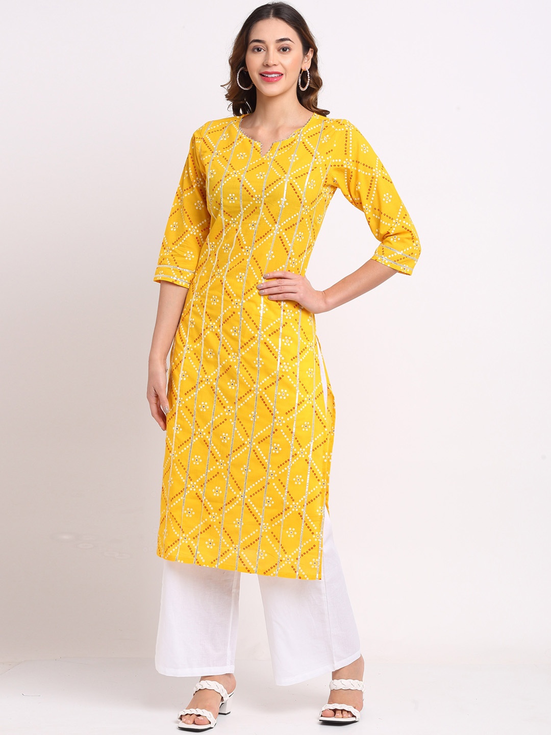 

Rajnandini Women Yellow Printed Regular Pure Cotton Kurta with Palazzos