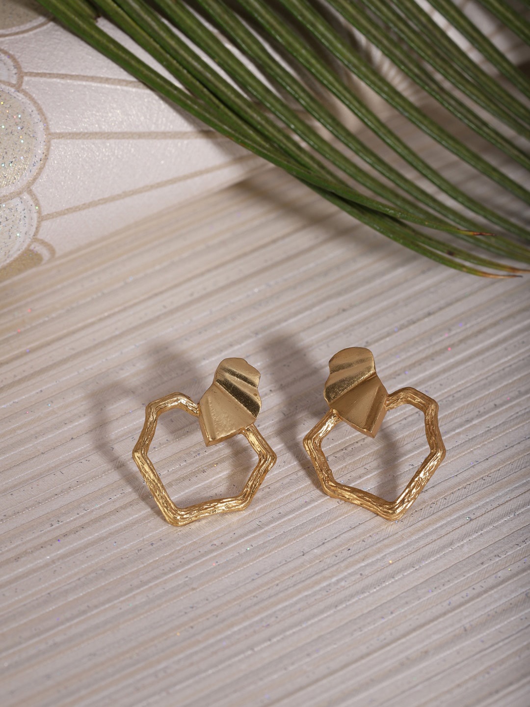 

Berserk Gold-Toned Heart Shaped Studs Earrings