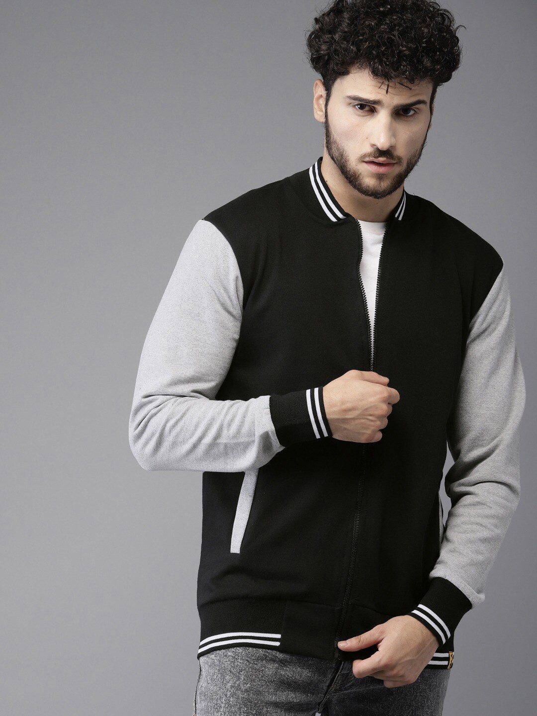 

Campus Sutra Men Black & Grey Colourblocked Windcheater Outdoor Varsity Jacket