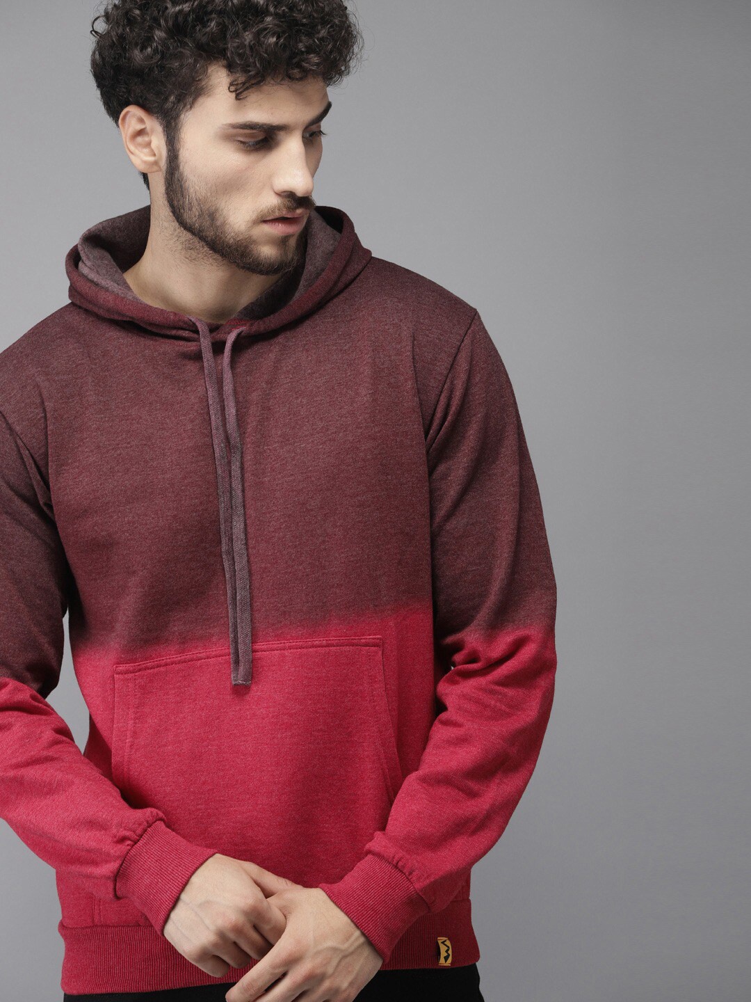 

Campus Sutra Men Maroon Colourblocked Hooded Sweatshirt