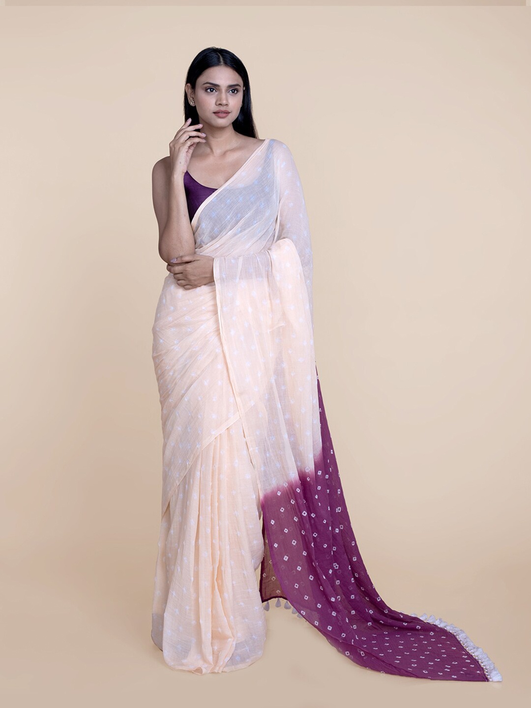 

Suta Peach & Purple Bandhani Pure Cotton Saree